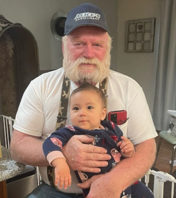 Filling the boot in city parking lot for fallen North Idaho fire fighter